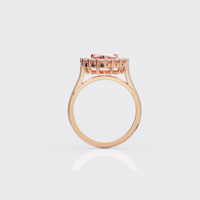 impresionante anillo sortija en oro macizo de 18 quilates con zafiro Padparadscha en talla pera rodeado de moissanitas en talla brillante.
